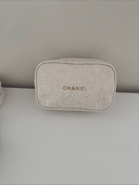 CHANEL Cream Textured Cosmetic Pouch with Gold Logo